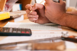 Carpenter doing calculations